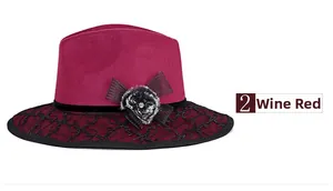 Close-up of wine red wool fedora featuring lace veil, pompom and crystal bow detail