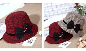 Detailed embroidery of flowers and rhinestones on a warm wool winter cloche hat