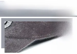 Detailed view of grey plush equestrian hat featuring rhinestone embroidery and stitching