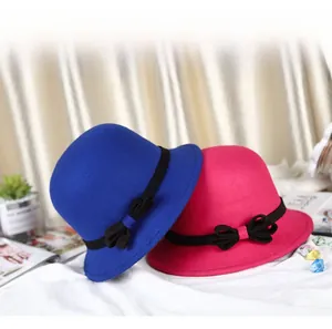 Blue and rose red wool felt bucket hats featuring elegant black bow ribbon accents