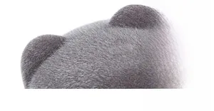Close-up of soft grey faux fur equestrian cap detailing plush texture and rounded ear design