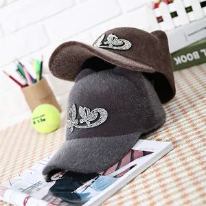 Plush cat ear equestrian caps with rhinestone bow in dark grey and brown colors