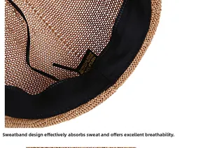 Detail view of woven paper hat interior featuring a black sweatband and adjustable drawstring