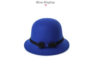 Close-up detail of Royal Blue wool cloche hat with black decorative band and side bow