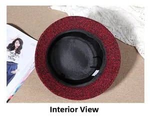Detail of winter bucket hat showing black inner lining and white care label inside