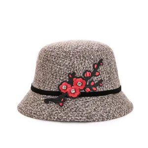 Elegant women's winter cloche hat in brownish grey tweed with red plum blossom embroidery