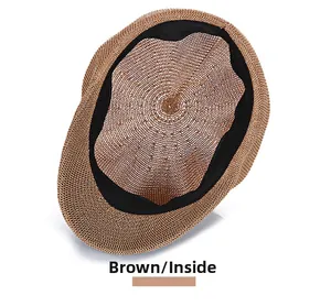 Detailed inside view of coffee straw newsboy cap with black sweatband and breathable texture