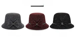 Three elegant wool felt cloche hats in grey, red, and black with rhinestone bows