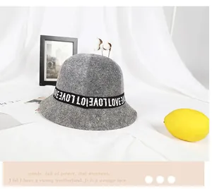 Gray wool felt cloche bucket hat featuring a black Love lettered ribbon detail