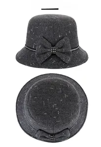 Detailed view of dark grey wool fedora hat for women with rhinestone bow decoration