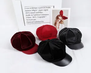 Winter newsboy caps in burgundy, red, grey, and black with fuzzy texture and leather brims