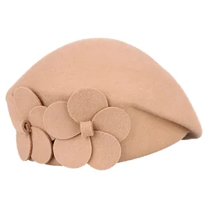 Elegant beige wool beret featuring dual floral accents for a minimalist winter style