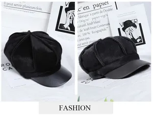 Detail of black newsboy cap featuring faux fur texture and a smooth leather brim