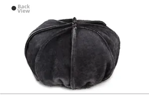 Back view of a plush black newsboy cap made of soft faux fur with stitched panels