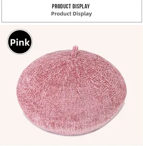 Close-up of pink chenille knit beret hat texture with soft fuzzy fabric detail