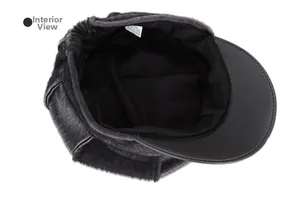 Detail view of newsboy cap interior showing faux fur texture and elastic band