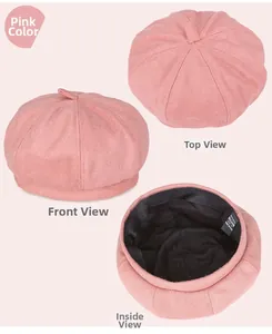 Detailed view of pink wool beret showing top structure, inner lining, and front profile