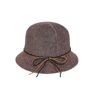 Foldable wool felt bucket hat for women in taupe with decorative bow accent