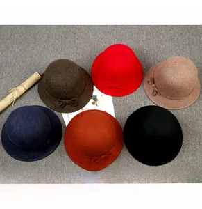 Flat lay of vintage Australian wool cloche hats for women in six various classic colors