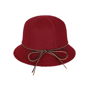 Deep red wool cloche bucket hat for women with a minimalist woven bow tie decoration