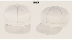 Front and side view of two white octagonal newsboy caps in soft wool-like fabric