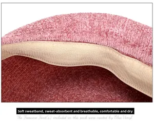 Close-up of pink beret hat interior with soft sweatband and breathable chenille fabric