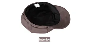 Detailed interior view of the brown newsboy cap with size 58 label and soft black lining