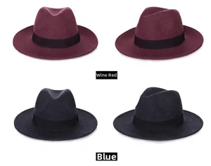 Detail view of wine red and dark blue wool fedora hats with black decorative bands