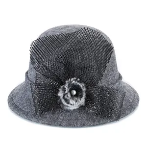 Elegant grey wool felt cloche hat with black mesh veil and pearl faux fur flower