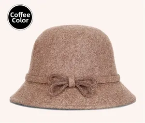 Close-up of wool cloche hat in coffee brown featuring a delicate bow detail