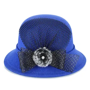 Elegant royal blue wool cloche hat with black mesh veil and pearl accent for women