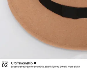Close-up of premium khaki wool fedora featuring precise brim stitching and black grosgrain ribbon