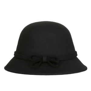 Elegant black Australian wool cloche hat for women with a vintage bow accent for autumn