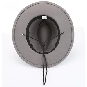 Detail view of the gray fedora interior showing the sweatband, chin strap, and size label