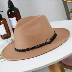 Classic camel wool fedora hat with a black braided leather band and gold vintage buckle