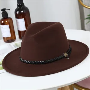 Classic dark brown wool fedora with woven leather band and gold emblem detail