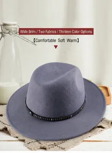 Detail of grey wool fedora hat with a black studded belt band and wide brim design