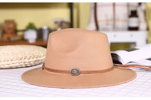 Close-up of wool fedora hat with double leather cord band and vintage silver buckle