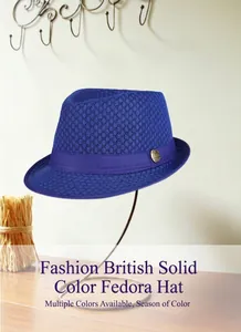 Detail view of royal blue breathable mesh fedora hat with satin band and metal logo
