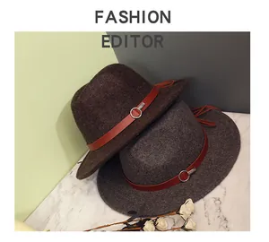Detail of wool fedora hats with leather bands, silver buckles and tassels decor