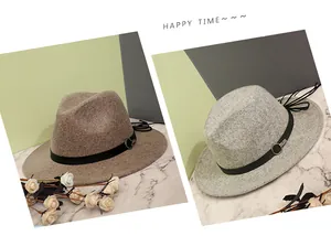 Detail of wool fedora hats in khaki and grey with decorative metal ring and fringe