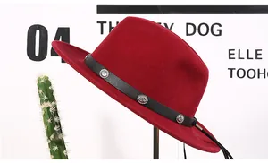 Close-up of wool fedora hat with black leather band and silver embossed metal rivets