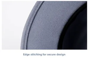 Macro view of grey wool felt beret featuring reinforced edge stitching design and texture