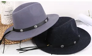 Detail of wool fedora hats in light grey and navy with leather bands and silver buckles