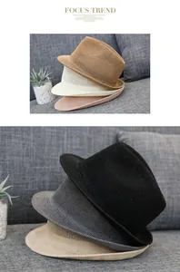 Detail view of woven sun hats in diverse colors including beige, khaki, and gray