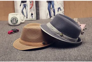 Detail of breathable mesh fedora hats with metal hana buckle and decorative ribbon