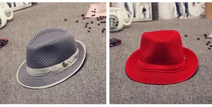 Close-up of breathable mesh fedora hats in grey and red with decorative band and metal button