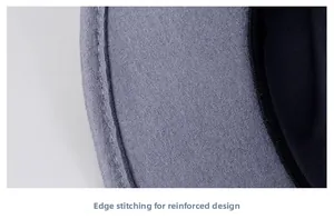 Close-up of wool fedora edge with reinforced stitching detail and textured grey felt