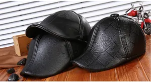 Detailed comparison of litchi grain and quilted textures on black PU ivy caps