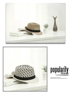 Close-up of breathable straw fedora with diamond weave texture and black decorative ribbon